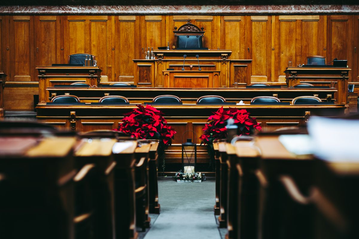 Illustrative formal tribunal hearing room, not the actual chambers